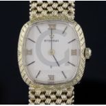 A lady's 9ct gold Eterna quartz wristwatch, on a 9ct woven link Eterna bracelet, overall length 17.