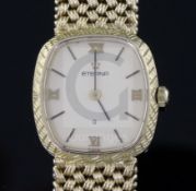 A lady's 9ct gold Eterna quartz wristwatch, on a 9ct woven link Eterna bracelet, overall length 17.