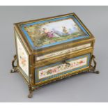 A Sevres style ormolu mounted stationery casket, late 19th century, the cover painted with a