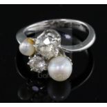 A white gold? and graduated two stone diamond and two stone cultured pearl set dress ring by C.