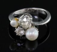 A white gold? and graduated two stone diamond and two stone cultured pearl set dress ring by C.