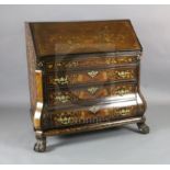 An early 19th century Dutch marquetry inlaid walnut bombe base bureau, the fall enclosing fitted