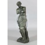 After the antique. A bronze figure the Venus de Milo, standing on naturalistic base, with green