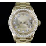 A lady's 1980's? 18ct gold and diamond set Rolex Oyster Perpetual Date wristwatch, on 18ct Rolex