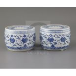 A pair of Chinese blue and white jars and covers, Yongzheng marks but later, each painted with lotus