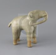 A large Thai Sawankhalok celadon figure of an elephant, 14th/15th century, H. 21cm, L. 25.