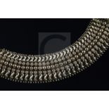 A 20th century Italian gold broad fancy link flexible bracelet, marks rubbed, approximately