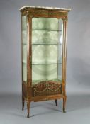 A late 19th century French Transitional style ormolu mounted kingwood and parquetry vitrine, in