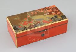 A Japanese lacquered jewellery casket, late Meiji period, the lid decorated with a peacock and