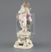 A Bow porcelain figure of Cupid, c. 1765-70, holding his bow and standing on a square pedestal