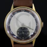 A gentleman's early 1940's 18ct gold Omega manual wind wrist watch, the silvered Arabic dial with