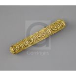 A late 18th century gilt filigree work needle or bodkin case, 4in., in original fish skin