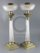 A pair of Victorian Hinks & Son's Patent silver plate mounted cut glass oil lamps, with cut glass