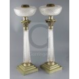 A pair of Victorian Hinks & Son's Patent silver plate mounted cut glass oil lamps, with cut glass