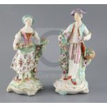 A pair of large Derby figures of flower sellers, c.1760, with flower painting to her skirt and his