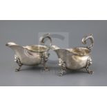 A pair of George V 18th century style silver sauceboats by Thomas of New Bond Street, with flying