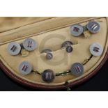 A 1930's Art Deco Cartier platinum? and ruby set eight piece dress stud set in original Cartier box,