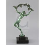 R. Guerbe for Max Le Verrier. A bronze model of a dancing maiden holding aloft a grapevine, signed