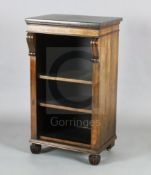 A William IV rosewood open bookcase, with later fossil marble top and three adjustable shelves, on