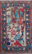 A Kashan pictorial red ground rug, with mask and floral border, signed, 6ft 9in by 4ft 4in.