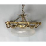 An Adam revival gilt brass and etched and cut glass hall lantern with pineapple finial, swagged