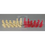 A late 18th century English white and red ivory chess set, in mahogany box, king 7cm tall, the