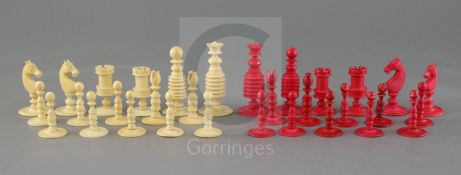 A late 18th century English white and red ivory chess set, in mahogany box, king 7cm tall, the