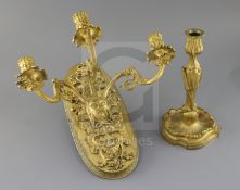A 19th century French ormolu three branch wall light, with foliate scroll branches emitting from a