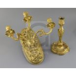 A 19th century French ormolu three branch wall light, with foliate scroll branches emitting from a