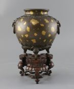 A fine and rare Chinese gold splashed bronze globular tripod vessel, 18th century,