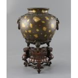 A fine and rare Chinese gold splashed bronze globular tripod vessel, 18th century,