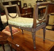 An Edwardian carved giltwood window seat, W.98cm