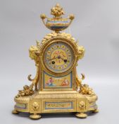A 19th century French ormolu and porcelain clock garniture
