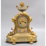 A 19th century French ormolu and porcelain clock garniture