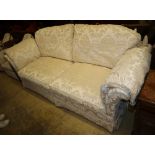 A large modern Knoll style cream silk foliate brocade upholstered two seater settee, W.238cm