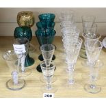 A collection of green glass and cut glass
