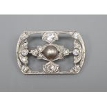 An early 20th century 18ct white gold diamond and pearl open plaque brooch, 3.25cm, gross 5.7 grams