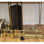 A Victorian brass galleried fire kerb, two kettle stands and fire brasses