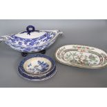 A Victorian Staffordshire blue and white sauce tureen and cover, three other pieces and a Coalport