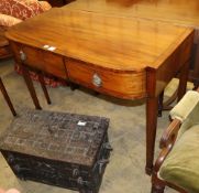 A Regency mahogany and ebony line inlaid three drawer bow fronted serving table, W.117cm