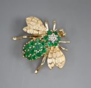 A 14ct gold emerald and diamond set bee brooch, width 3cm, gross 8.4 grams