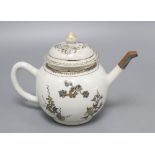 An 18th century Chinese export porcelain teapot, gilt and en grisaille painted with foliage,