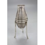 A Middle Eastern white metal vase on stand with engraved decoration, H.13cm