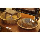Two 19th century turned wood bowls, largest 47cm and a primitive stool, W.28cm