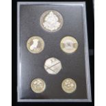 Royal Mint UK cased proof coin sets to include - 2008 Royal Shield of Arms, 2012, 2013 and 2014