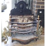 A cast iron and brass fire grate, W.82cm, H.76cm, a.f.