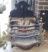 A cast iron and brass fire grate, W.82cm, H.76cm, a.f.