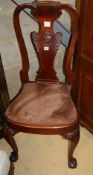 A George I style mahogany hall chair, with acanthus carved vase splat back, H.104cm