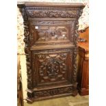 A late 19th century Flemish carved oak fall front secretaire cabinet, W.106cm, H.162cm