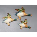 Three Beswick Mallard duck wall plaques, largest 22cm